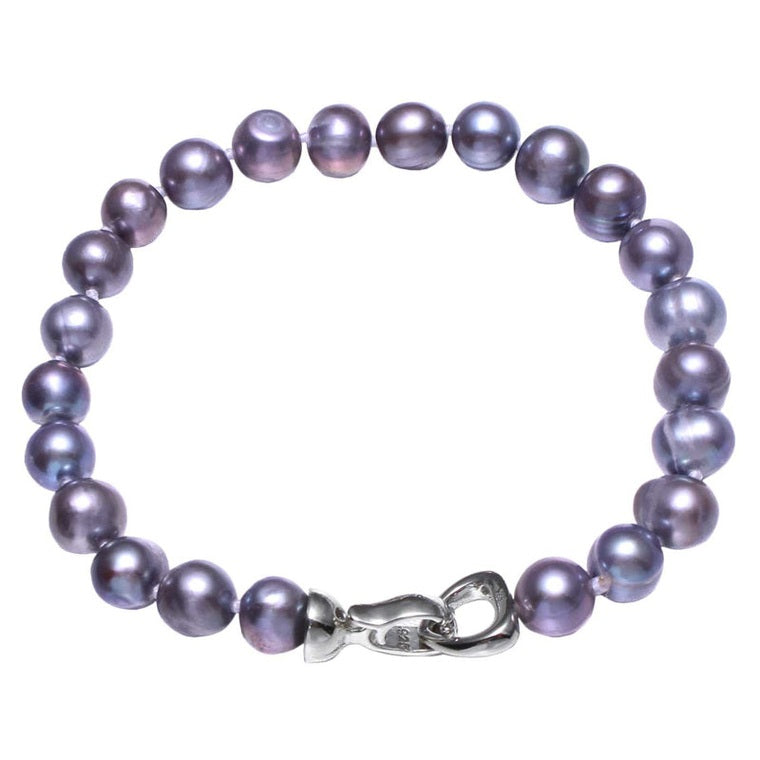 Handgeknoopt zoetwater parel armband met blauw-grijze parels, bovenaanzicht | Grizelle