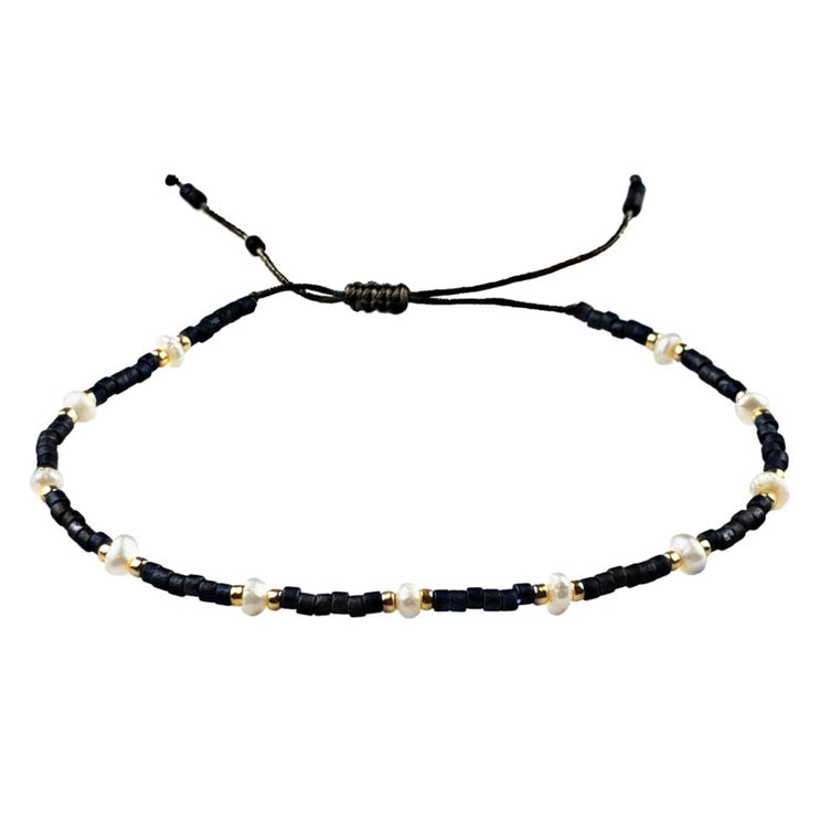 Wit zoetwater parel schuif armband met zwarte en gouden kraaltjes | Mini Pearl Bead Black