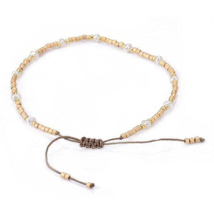 Wit zoetwater parel armband, schuifarmband, achterzijde | Mini Pearl Bead Gold