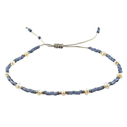 Wit zoetwater parel armband met blauwe en gouden kraaltjes en schuifsluiting | Mini Pearl Bead Pursian Blue 
