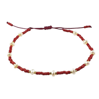 Wit zoetwater parel armband met rode en gouden kraaltjes en schuifsluiting | Mini Pearl Bead Red