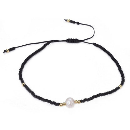 Wit zoetwater parelarmband met zwarte kraaltjes | Mini Pearl One Black Color