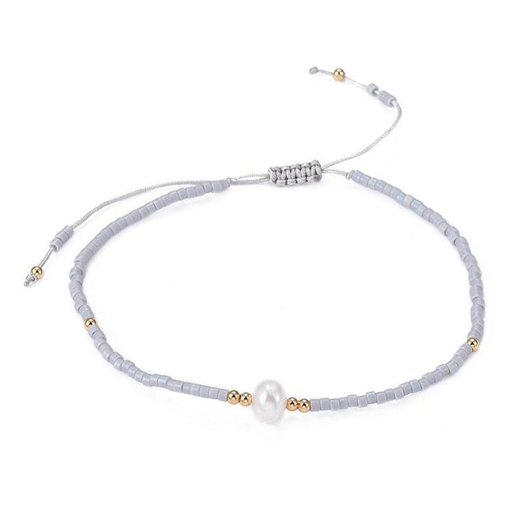 Wit zoetwater parel armbandje met grijze kraaltjes | Mini Pearl one Grey Color