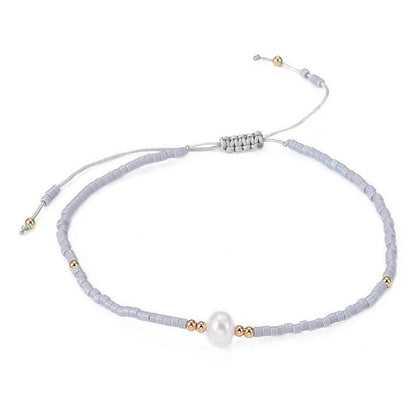 Wit zoetwater parel armbandje met grijze kraaltjes | Mini Pearl one Grey Color
