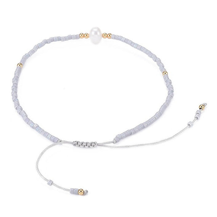 Wit zoetwater parel armbandje met grijze kraaltjes, achterzijde | Mini Pearl one Grey Color
