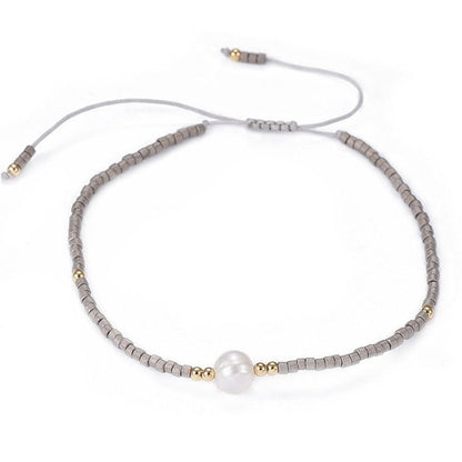 Wit zoetwater parel armband met leverkleurige kraaltjes | Mini Pearl One Liver Color