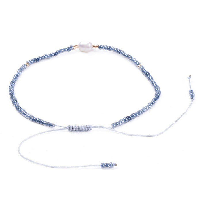 Wit zoetwater parel armband met licht blauwe kraaltjes achterzijde | Mini Pearl One Shiny Light Blue