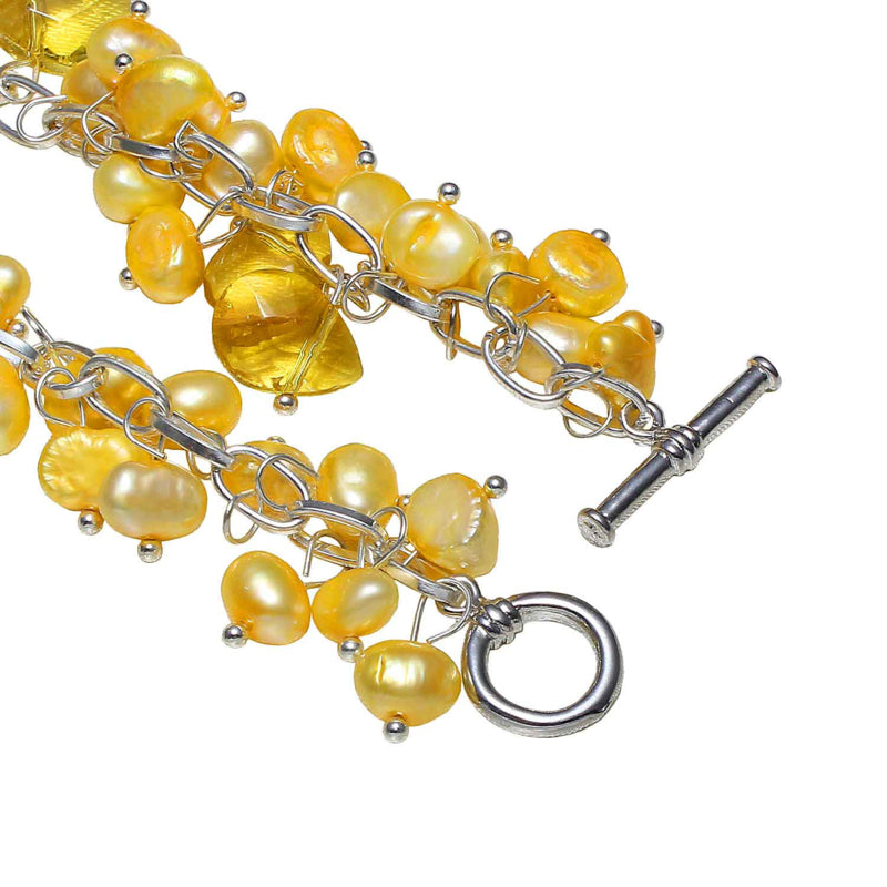 Slotje van geel zoetwater parel armband met parel bedeltjes en geel kristal | Sunny