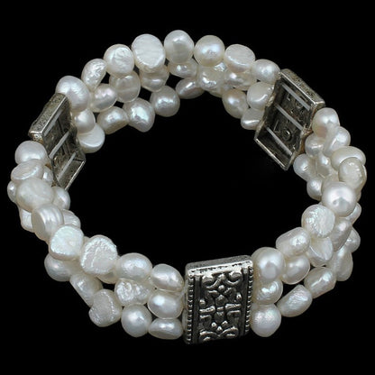 Wit zoetwater parel armband met 3 rijen met zwarte achtergrond | Three Row White Pearl