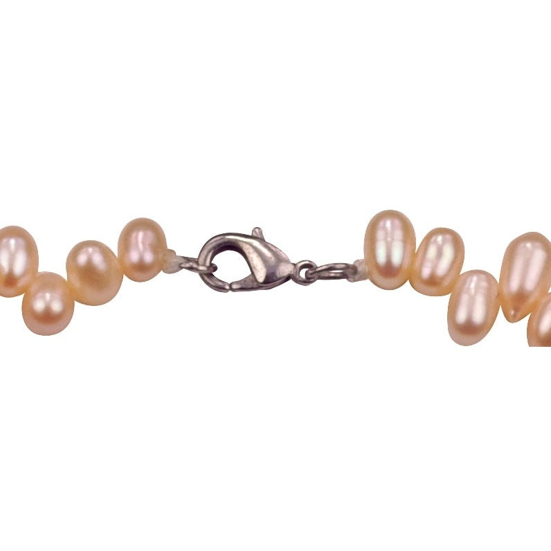 Slotje van zoetwater parel armband met zalm kleurige parels en sterling zilver | Zamia