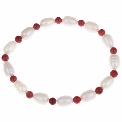 Wit zoetwater parel armband met rood koraal, elastisch | Claudine