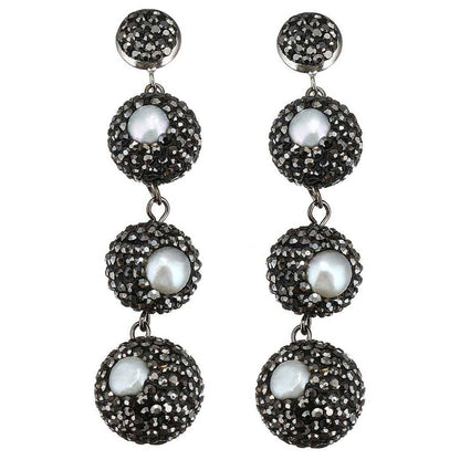 Lange zoewater parel oorbellen met witte parels en zwarte stras steentjes | Bright Pearl Balls