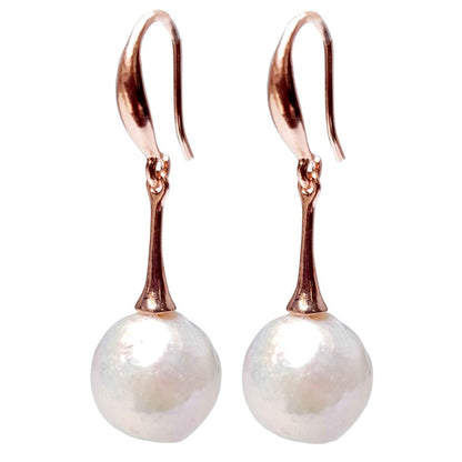 Lange witte zoetwater parel oorbellen met rose goud kleur | Kasumi White Rose Gold