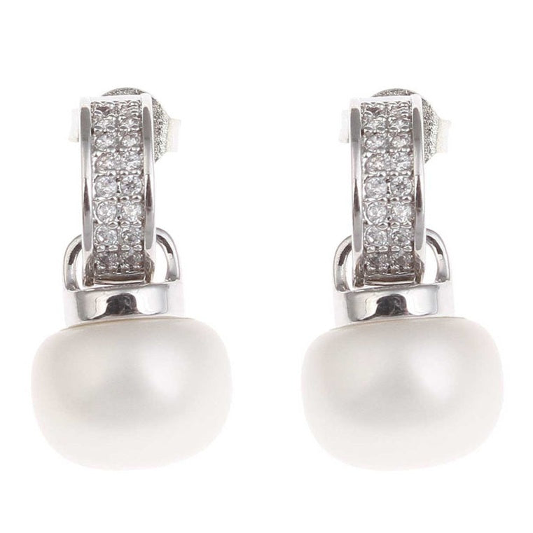 Witte zoetwater parel oorbellen met stras steentjes, witte parel oorstekers met stras steentjes | Zirca Big W