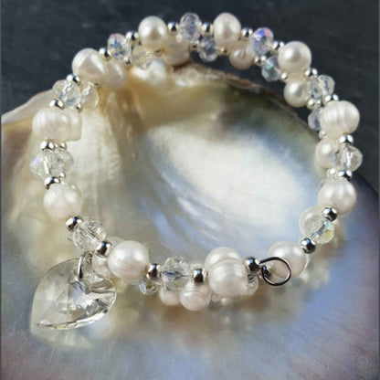 Wit zoetwater parel wikkel armband met kristallen hartje liggend in schelp | Wrap Pearl Crystal Heart
