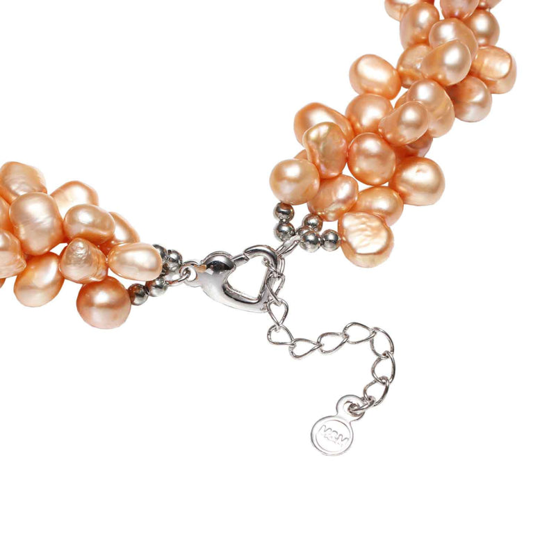 Slotje van oranje zoetwater parelketting met 3 rijen parels | Azina