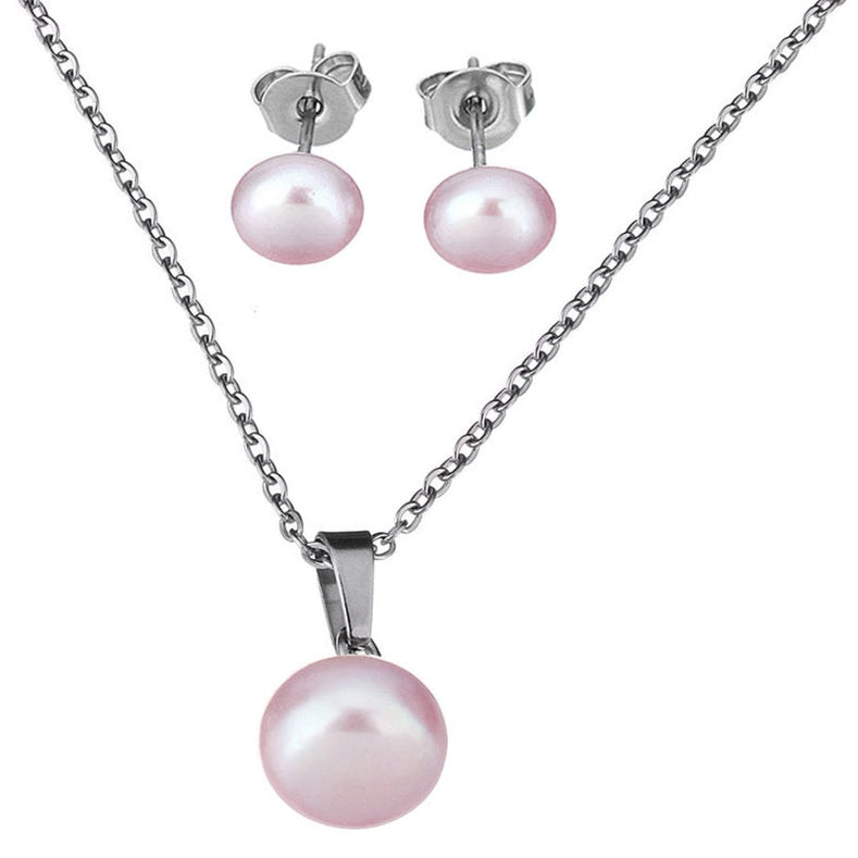Zoetwater parel set bestaande uit een parelketting en parel oorbellen met roze parels en zilver edelstaal | set Brit P