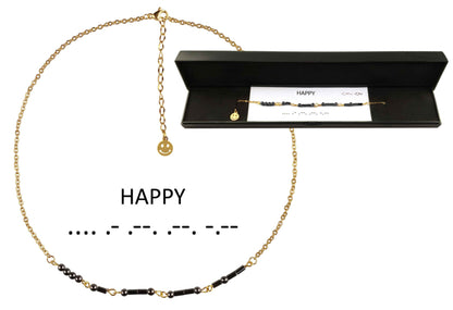Zwarte edelstenen ketting met goud edelstaal en hematiet stenen die het woord HAPPY in morse code weer geeft in mooi sieradendoosje | Morse Code Happy Black Hematite Gold