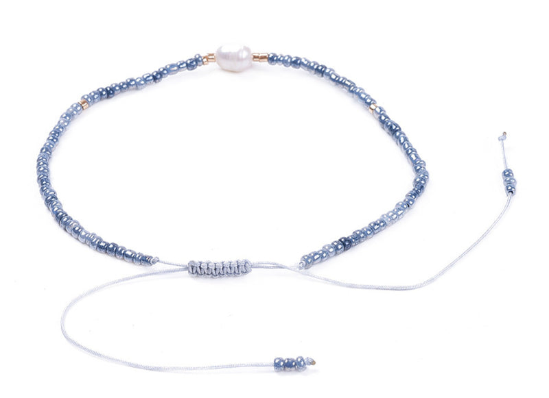 Wit zoetwater parel armband met licht blauwe kraaltjes achterzijde | Mini Pearl One Shiny Light Blue