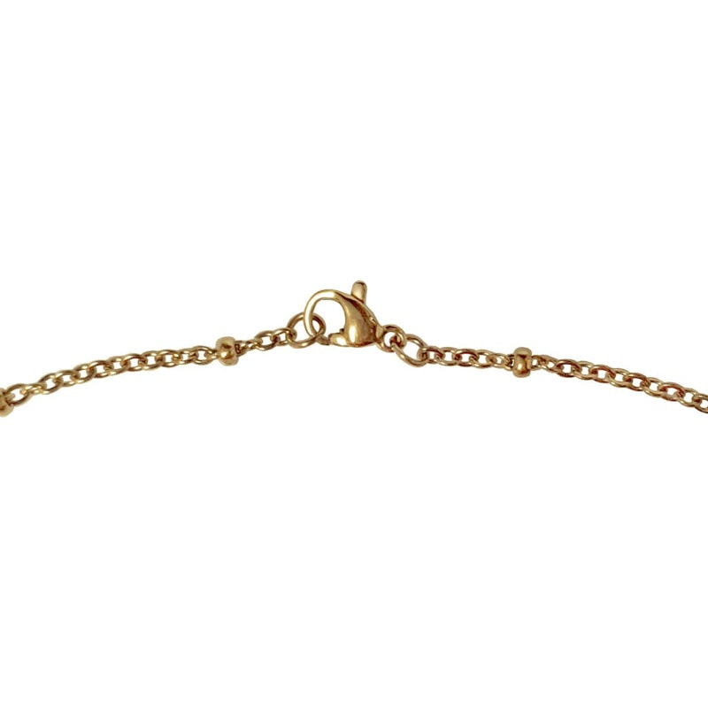 Slotje van witte parelmoeren ketting met wit parelmoer hanger aan gouden edelstalen ketting | Gold Shell